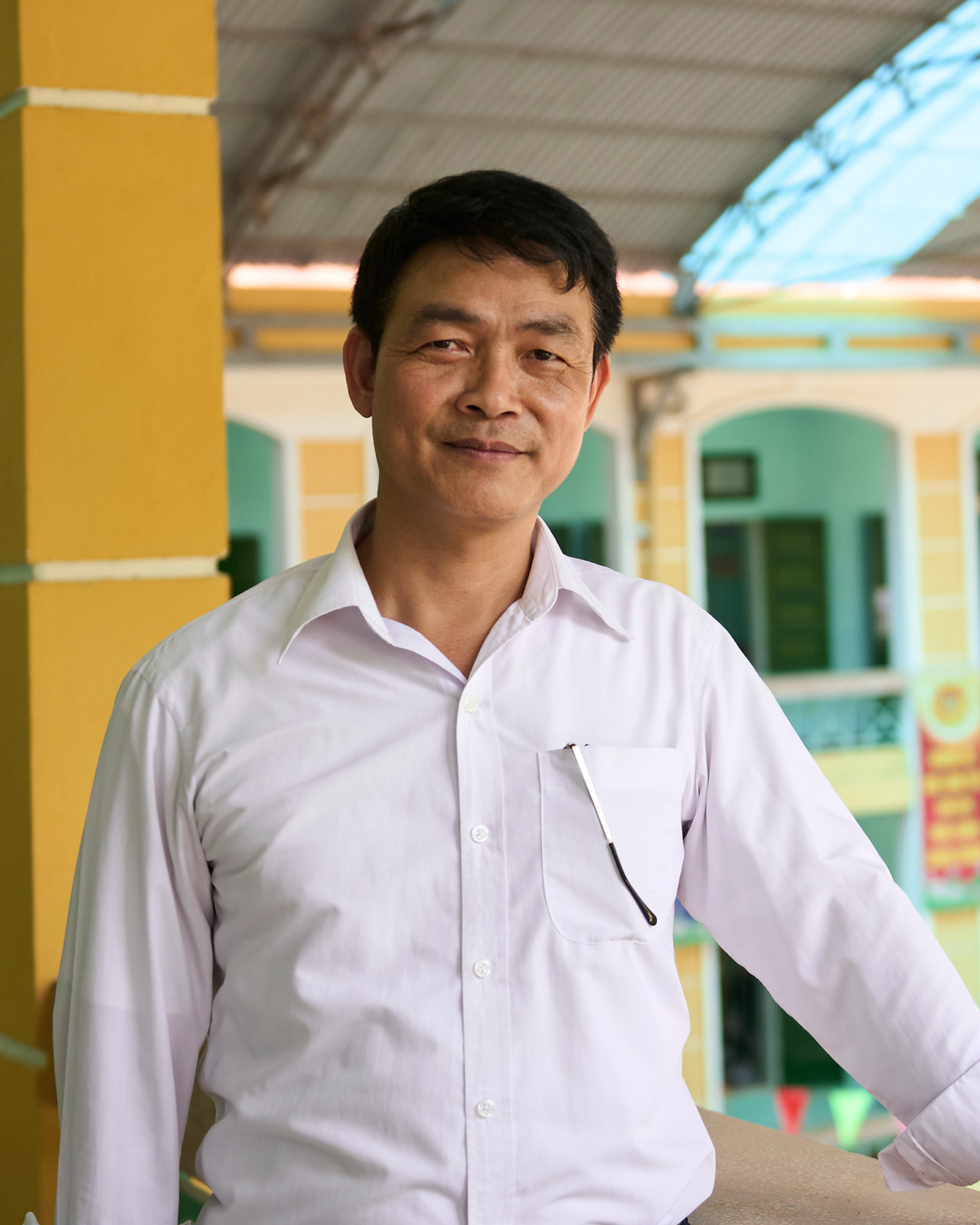 A portrait of Phạm Thiên Nam, Hiền Lương’s principal.