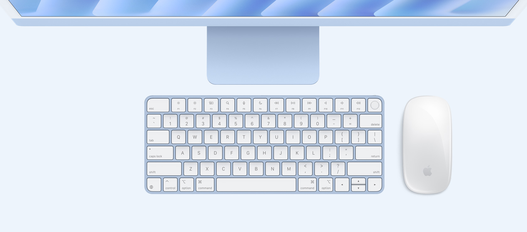 Overhead view of blue iMac with colour-matching mouse and keyboard