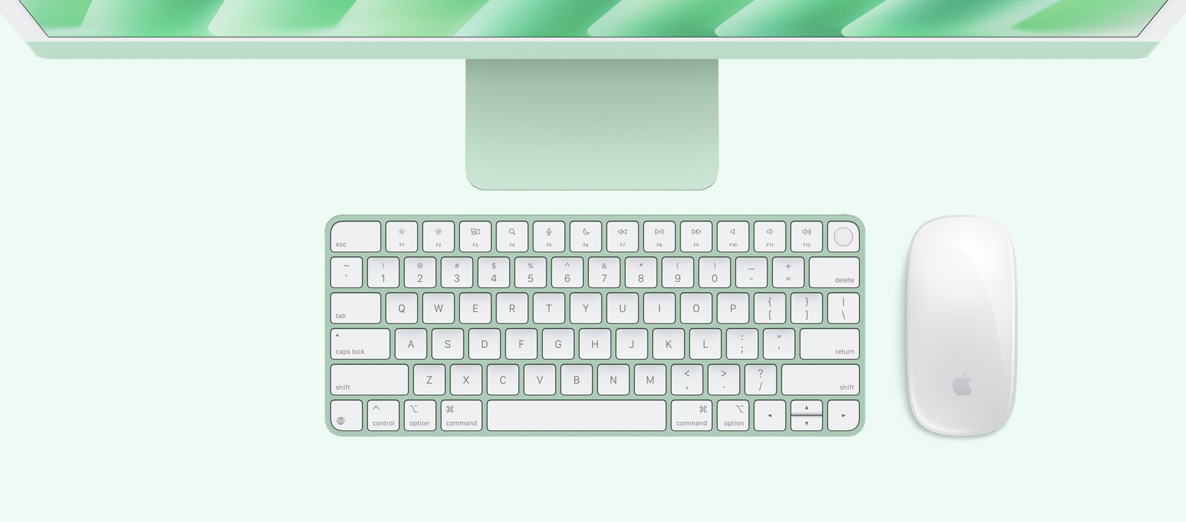 Overhead view of green iMac with colour-matching mouse and keyboard