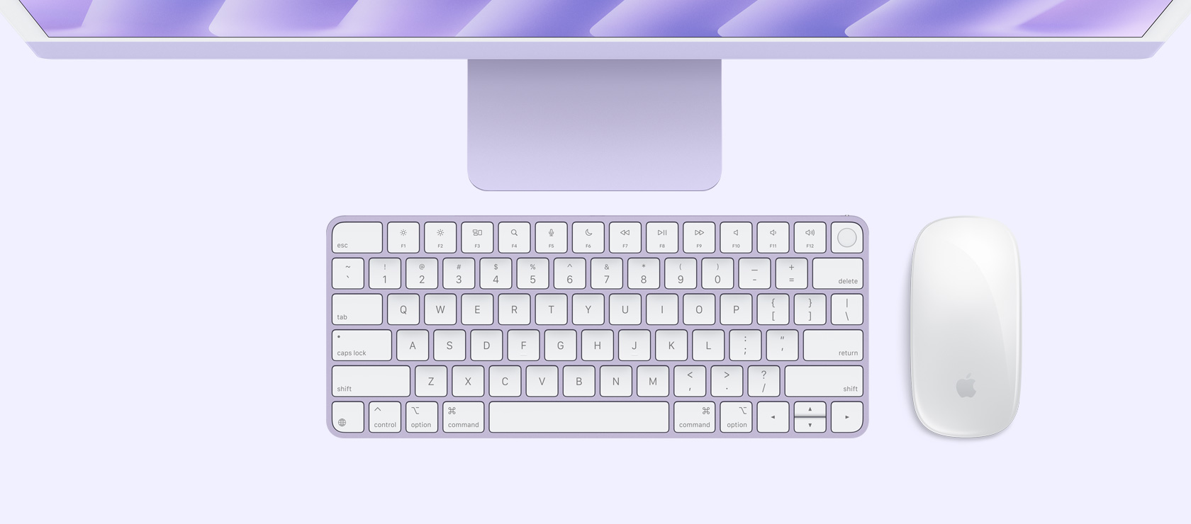 Overhead view of purple iMac with colour-matching mouse and keyboard