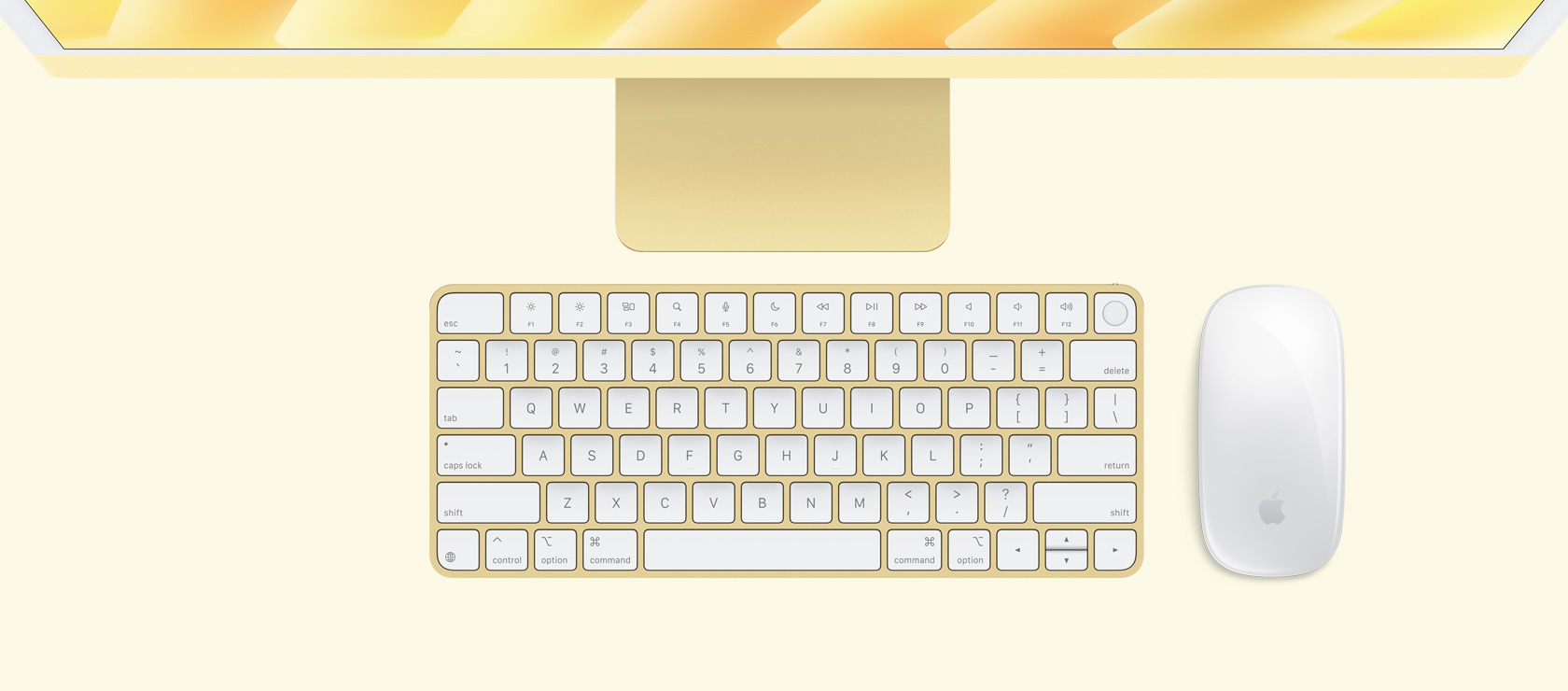 Overhead view of yellow iMac with colour-matching mouse and keyboard