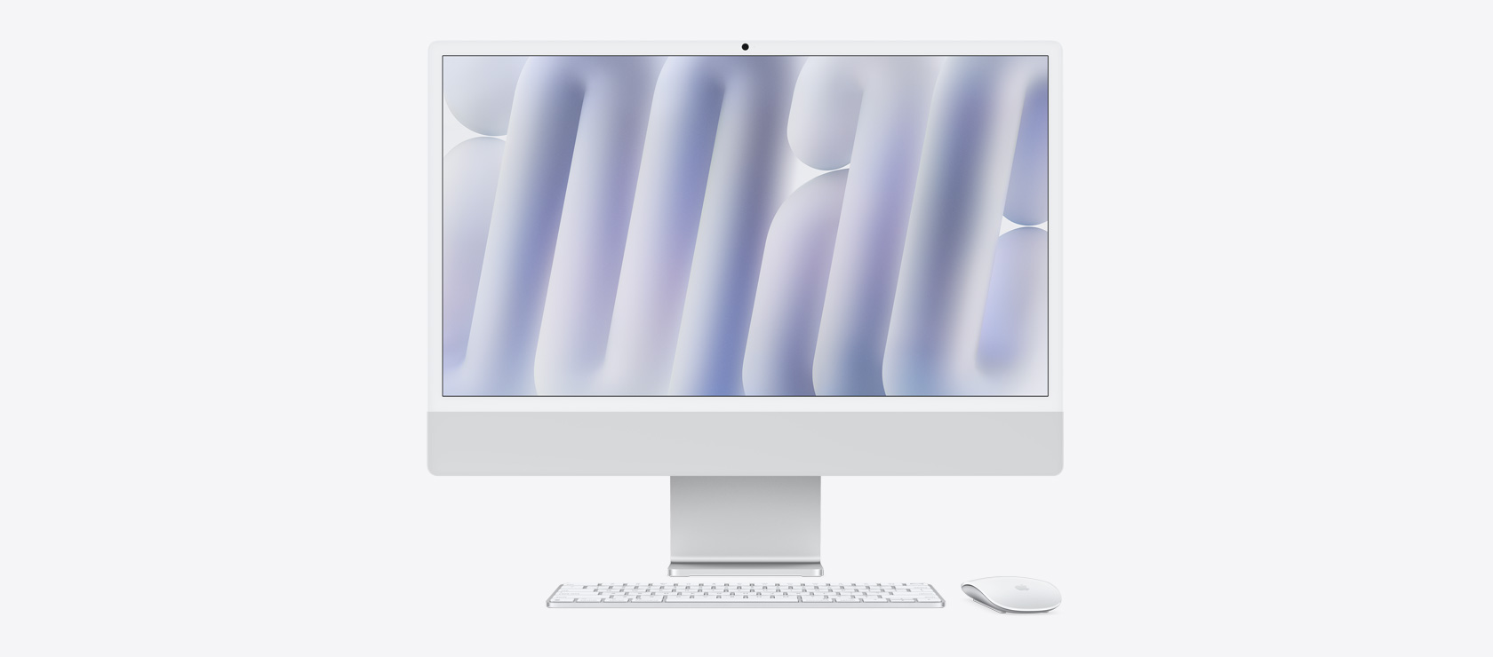 Front view of silver iMac with colour-matching mouse and keyboard