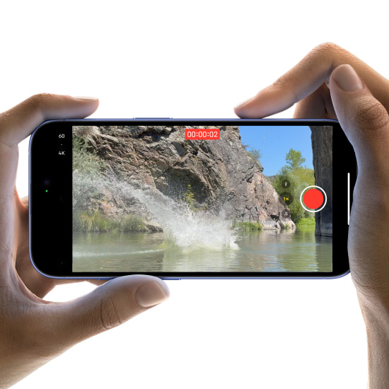 Right finger slides along side of phone to adjust camera settings with Camera Control